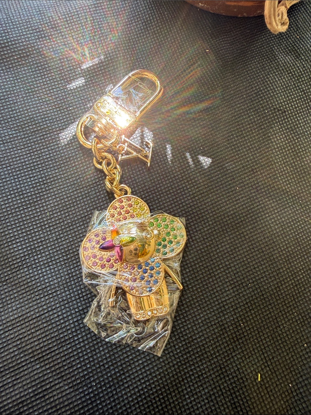 Gold-tone keychain charm holder